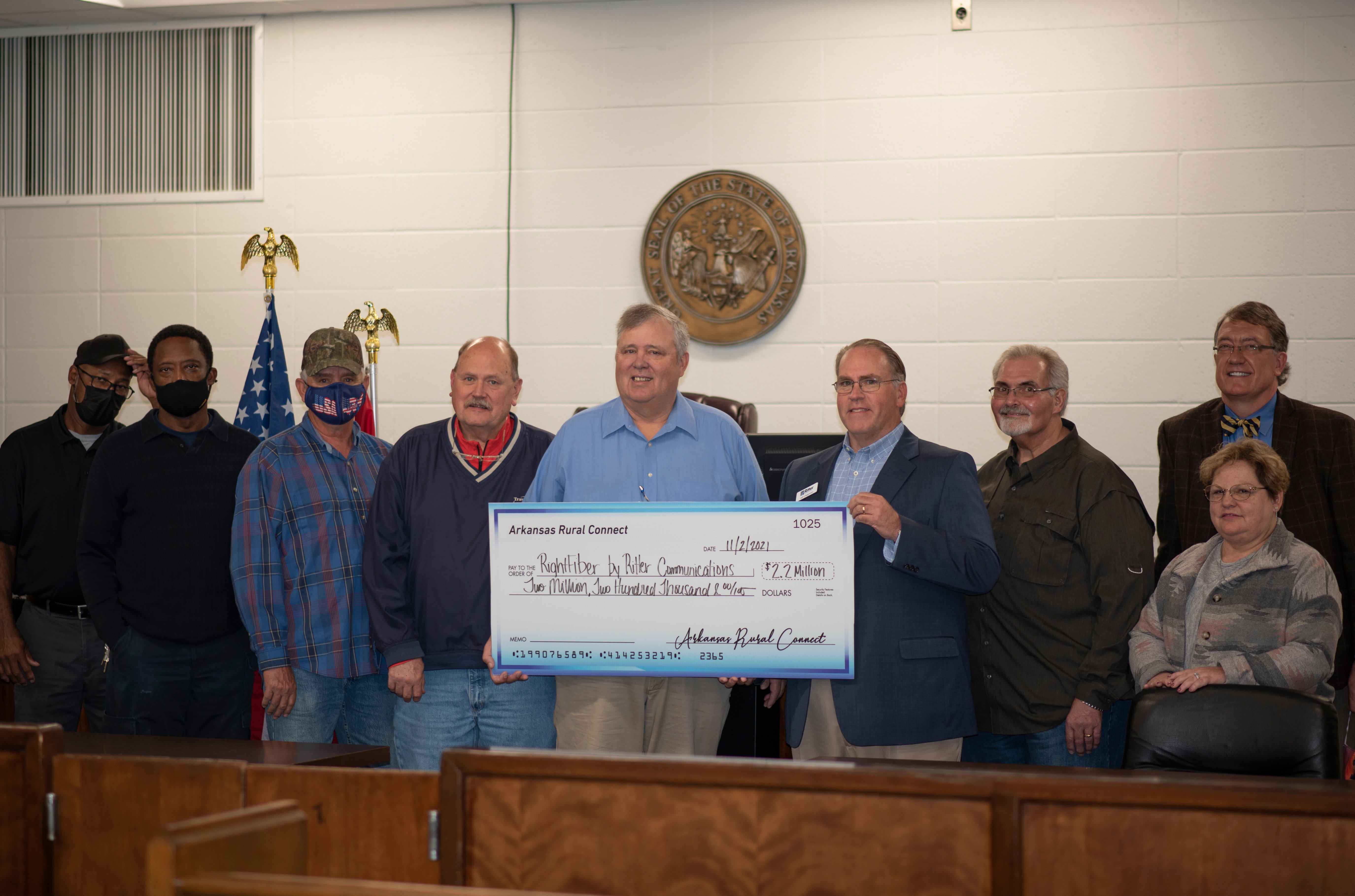 Pictured: Members of the Brinkley City Council join Ritter Communications in accepting a $2.2 million investment through the Arkansas Rural Connect (ARC) grant program to extend Ritter Communications new fiber optic network to local residents. (L-R): Alderman Michael Tucker, Alderman Eddie Harvey, Alderman Billy Waggle, Alderman Wally Shaw, Brinkley Mayor Gary Hennard, Ritter Communications Vice President & General Manager of RightFiber Jeff Chapman, Alderman Ron Burrow, City Clerk & Treasurer Stacey Roche, and City Attorney Baxter Sharp.